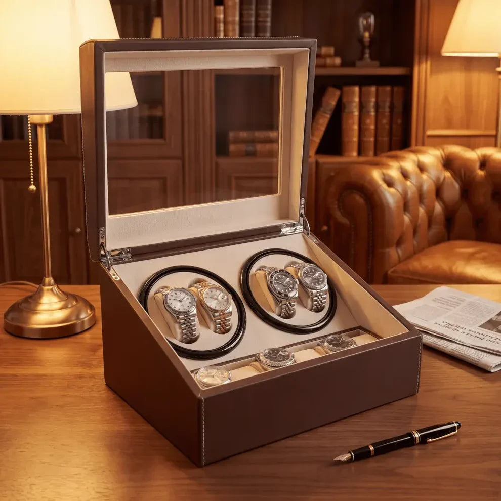Brown leather watch winder with 4 automatic rotors, 6 storage slots, glass lid and beige suede interior.