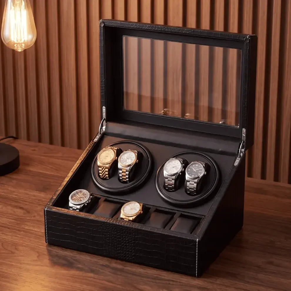 Roche Noire watch winder in crackled black PU leather with glass lid, 4 rotating slots and 6 fixed storage compartments.