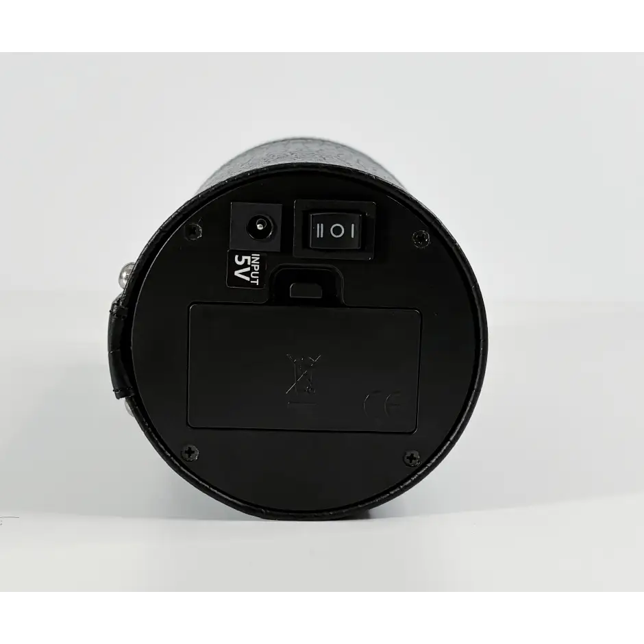 Black base of the Rocket watch winder with 5V power port, control switch and battery compartment.