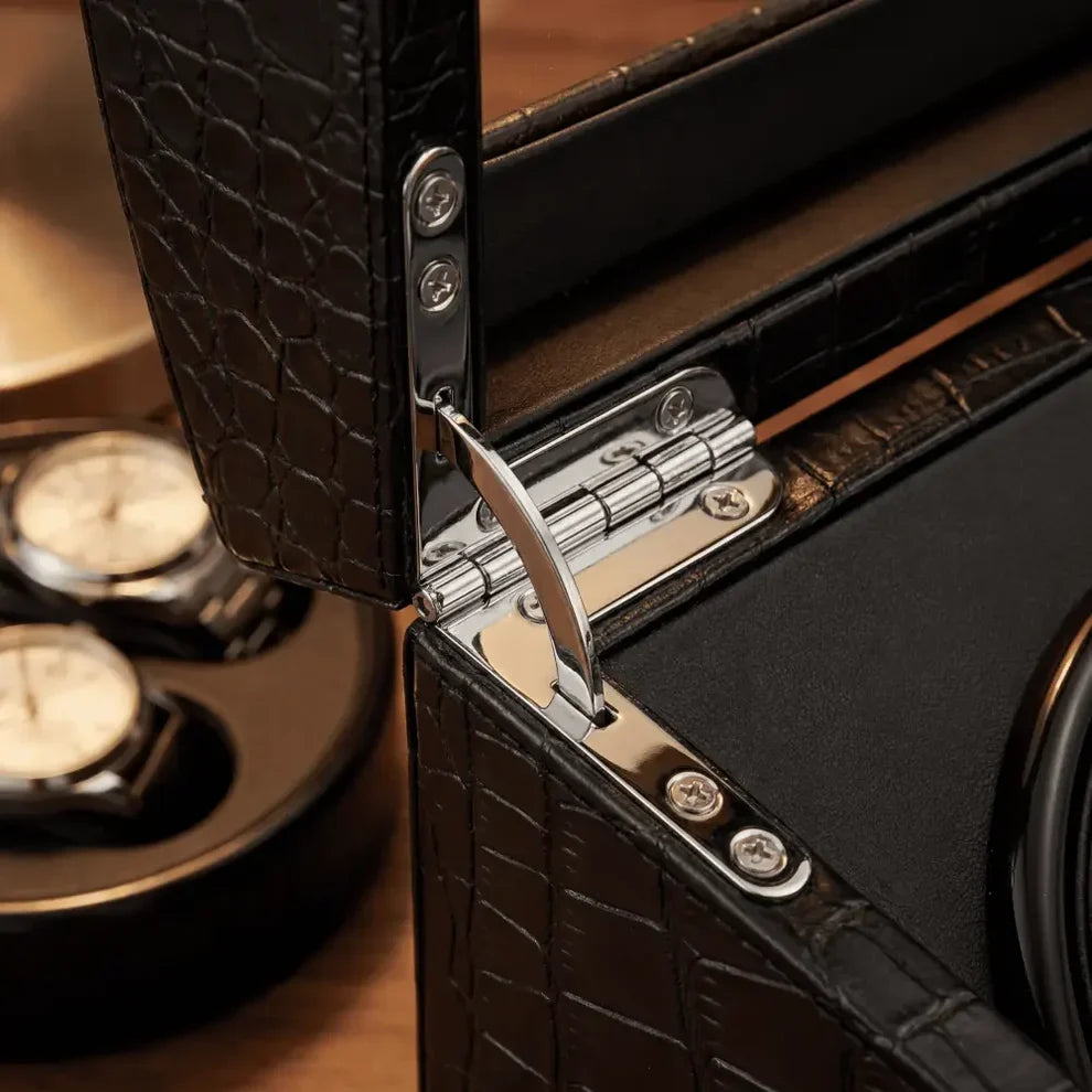 Roche Noire watch winder in crackled black PU leather with sturdy metal hinges and elegant interior.