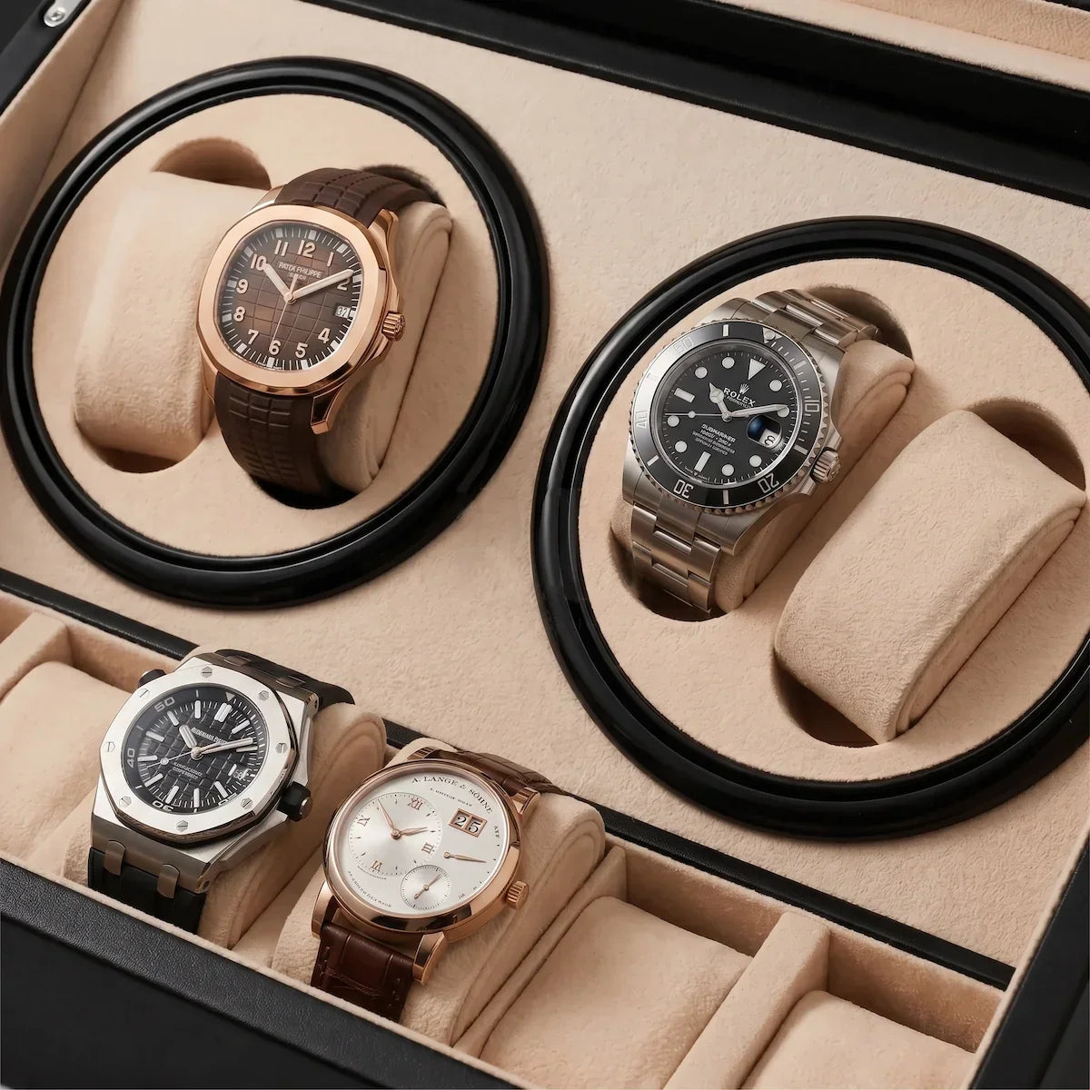 Black watch winder with 4 rotors, beige suede interior and luxury watches displayed under an elegant glass lid.