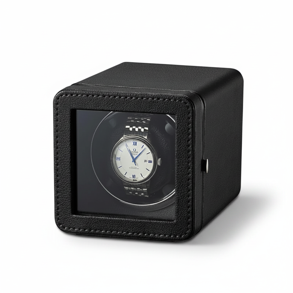 Black cube-shaped automatic watch winder with textured finish and transparent viewing window.