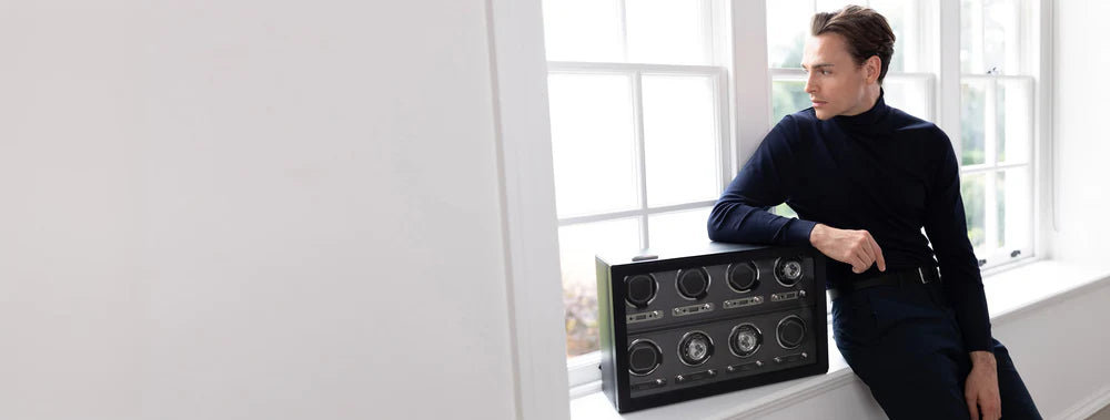 elegant man watch winder posing