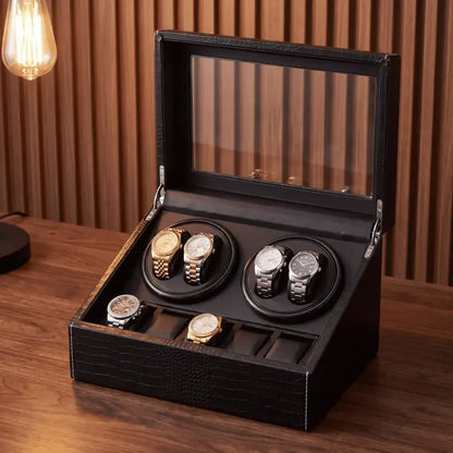 Roche Noire watch winder in crackled black PU leather with glass lid, 4 rotating slots and 6 fixed storage compartments.