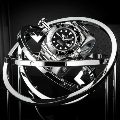 Black and silver metal Astronome Comète automatic watch winder, modern spherical design for a luxury watch.