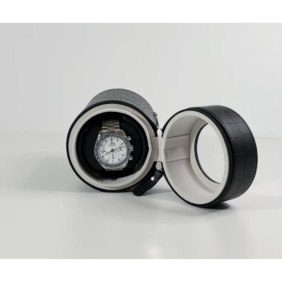 Black Rocket travel winder in crocodile faux leather with automatic watch on a grey suede interior cushion.