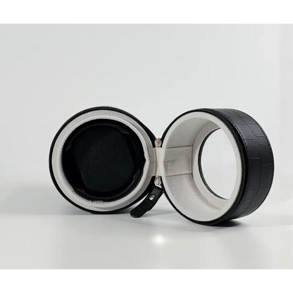 Black travel winder in crocodile faux leather with grey suede interior for one automatic watch.
