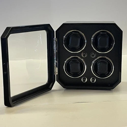Black Gioco Carbone watch winder for 4 watches with carbon fibre finish, glazed door and built-in LED lighting.