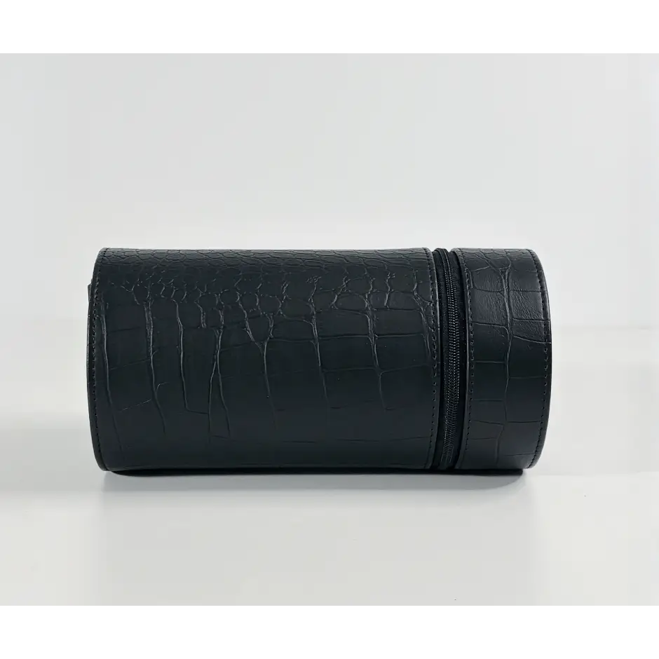 Black Rocket travel winder in crocodile-effect faux leather, compact cylindrical format for an automatic watch.