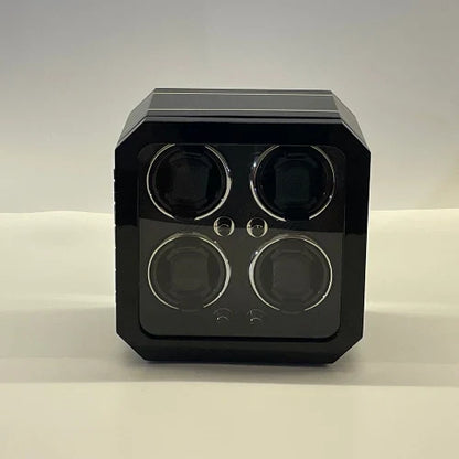 Black Gioco Carbone automatic watch winder for 4 watches with carbon fibre finish and acrylic front.