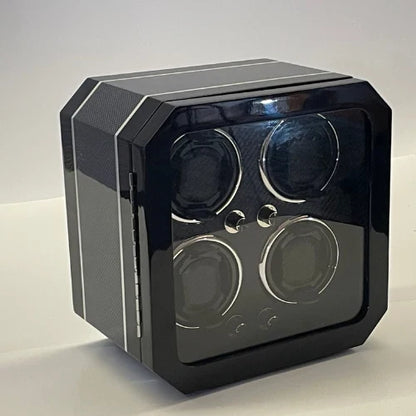 Black carbon fibre Gioco Carbone watch winder with 4 slots and an elegant glazed front.