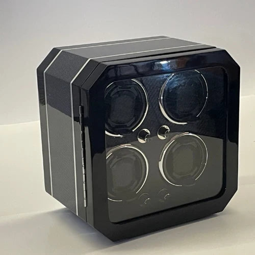 Black carbon fibre Gioco Carbone watch winder with 4 slots and an elegant glazed front.